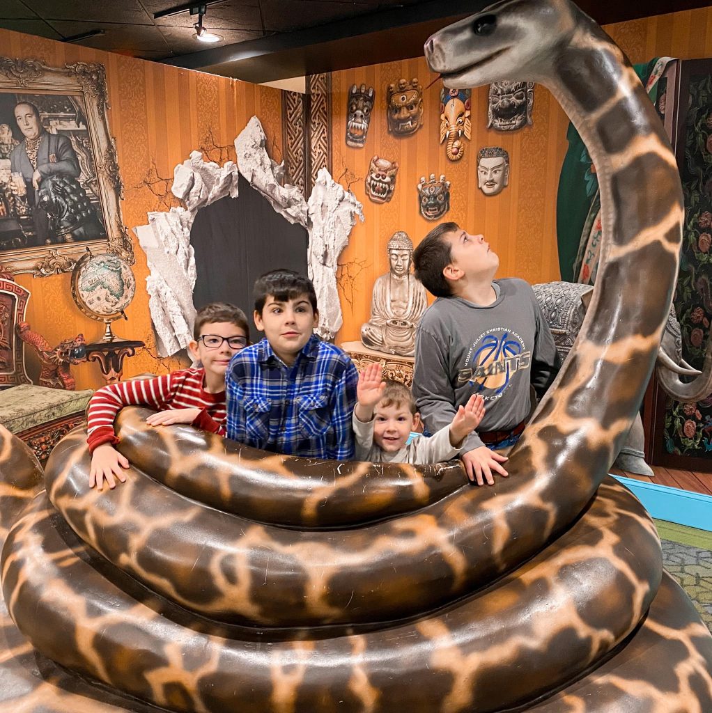 The author's four children with an exhibit from the Ripley's Aquarium