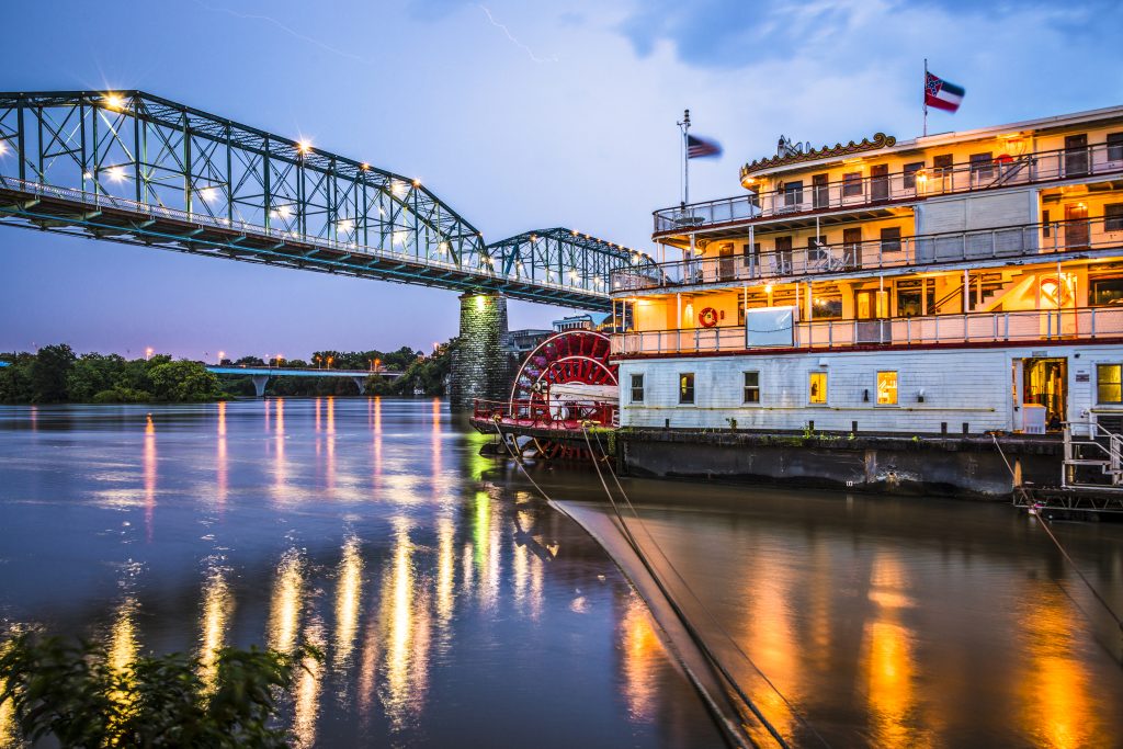 The Southern Belle Riverboat at night on the river.
