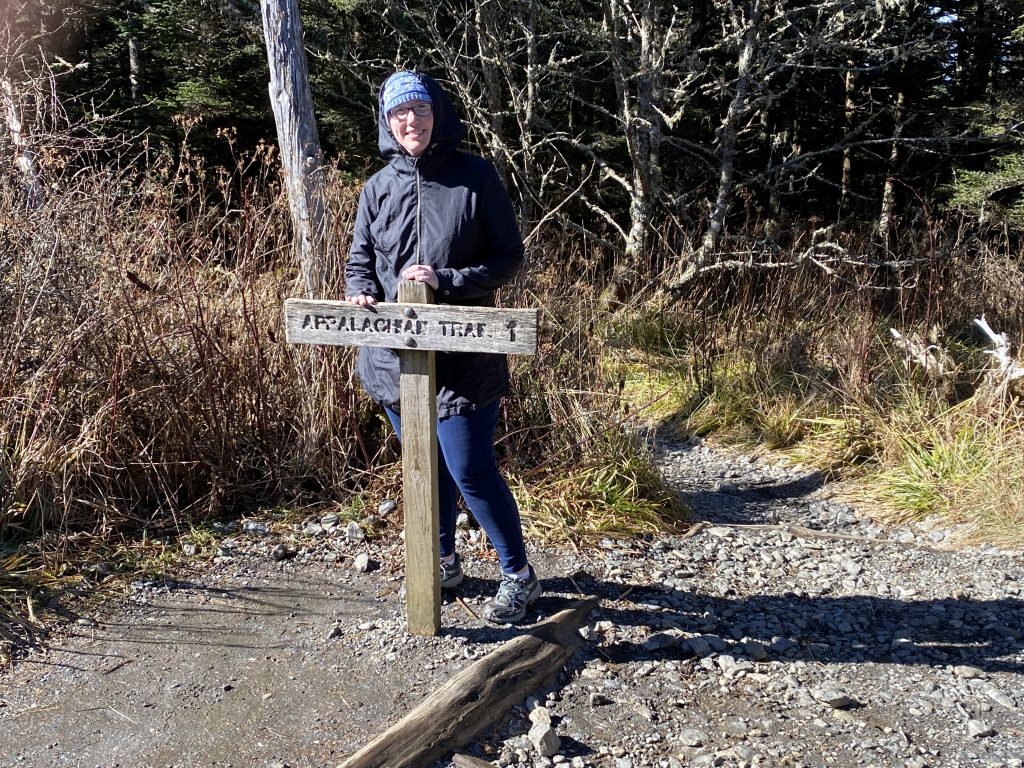 author in front of the Appalachian Trail sign on the Clingmans Dome Trail