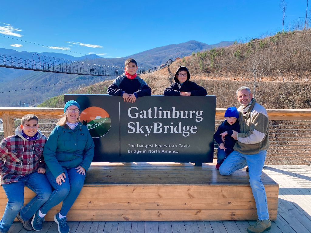 the author and her family at the SkyBridge sign