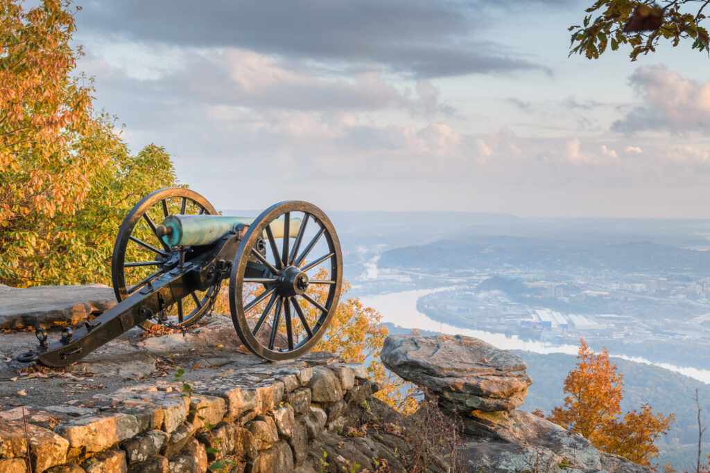 civil war cannon on top of hill overlooking chattanooga during fall