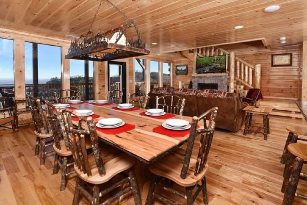 dining and living area of luxury cabin in Pigeon Forge